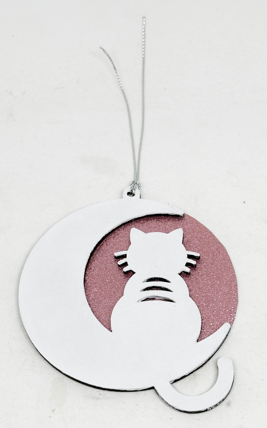 White wooden cat Christmas bauble with moon on personalized background
